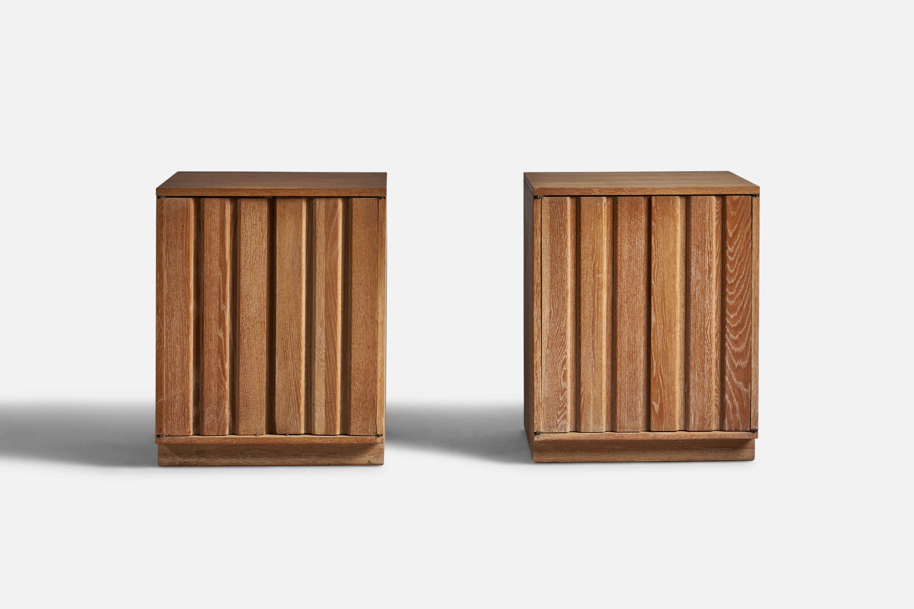 A pair of solid oak nightstands or cabinets, designed and produced by Sligh Furniture, Grand Rapids, Michigan, US, 1950s.