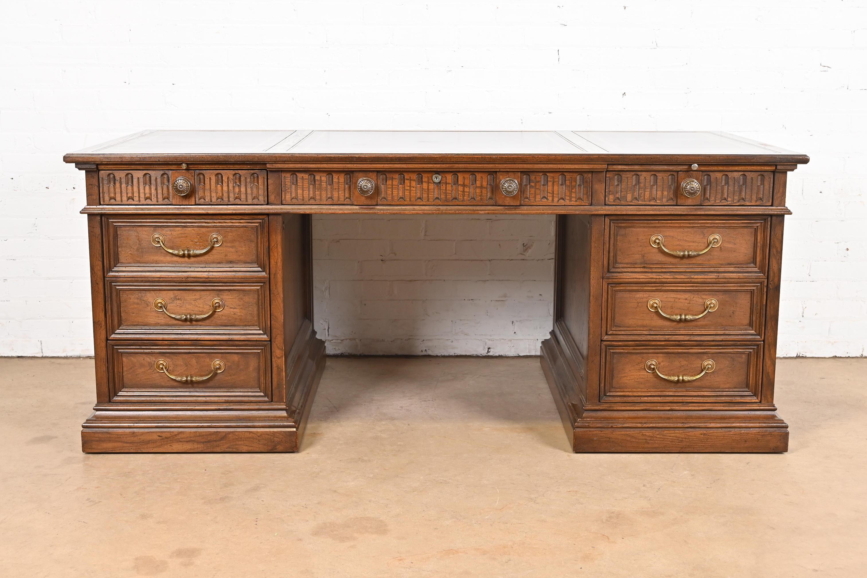 American Sligh Furniture Regency Carved Oak Leather Top Executive Desk, Circa 1960s
