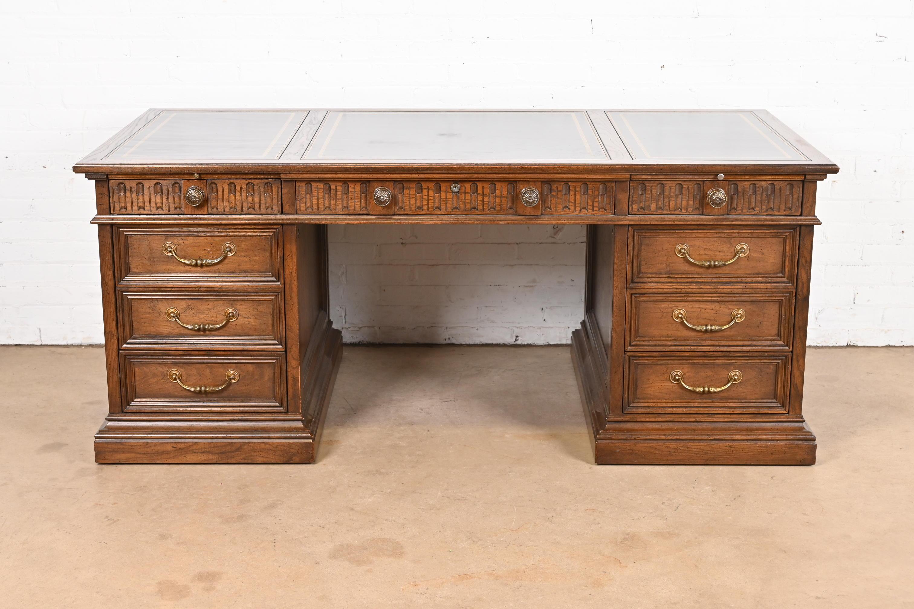 Sligh Furniture Regency Carved Oak Leather Top Executive Desk, Circa 1960s In Good Condition In South Bend, IN