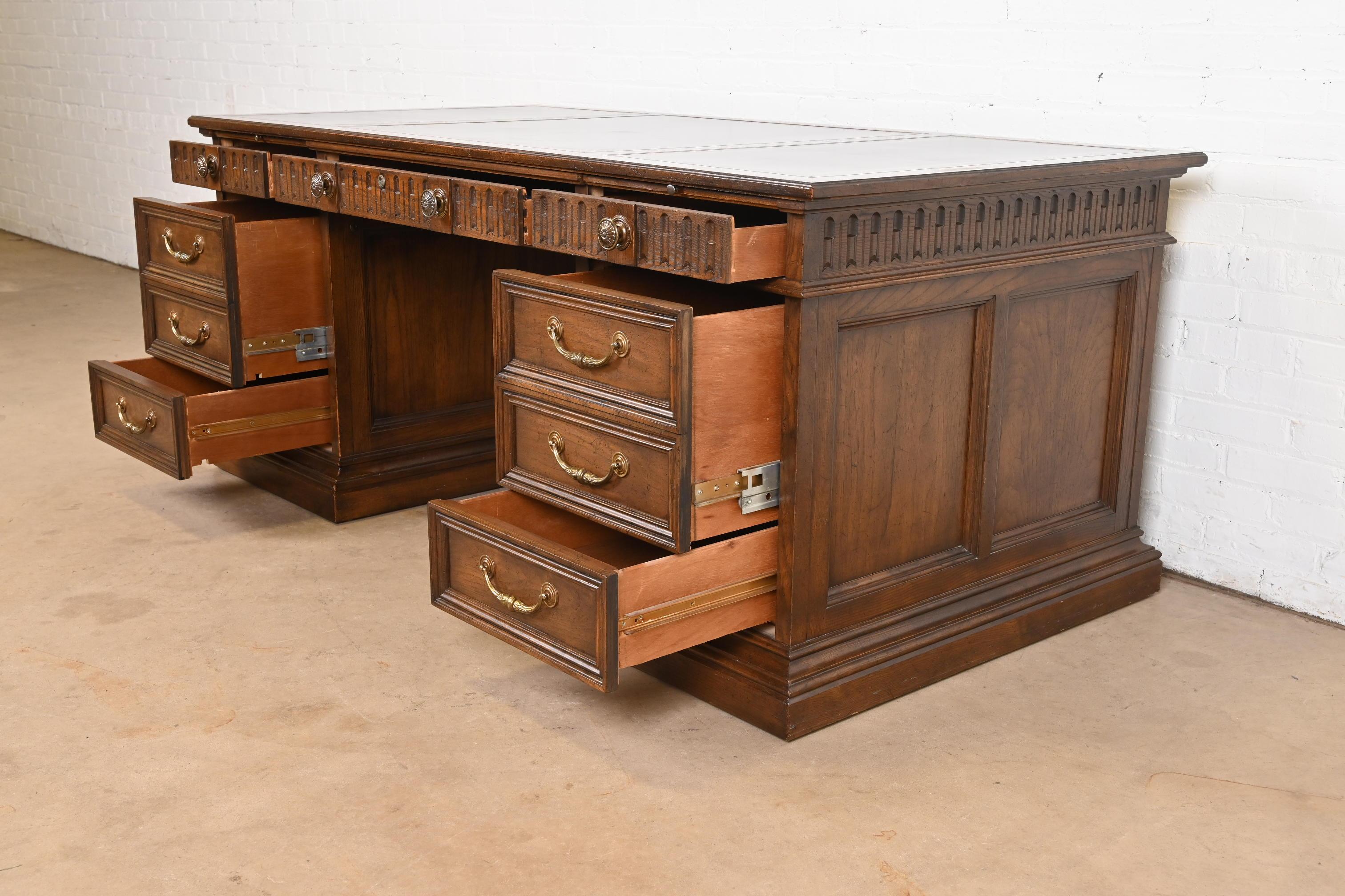 Brass Sligh Furniture Regency Carved Oak Leather Top Executive Desk, Circa 1960s