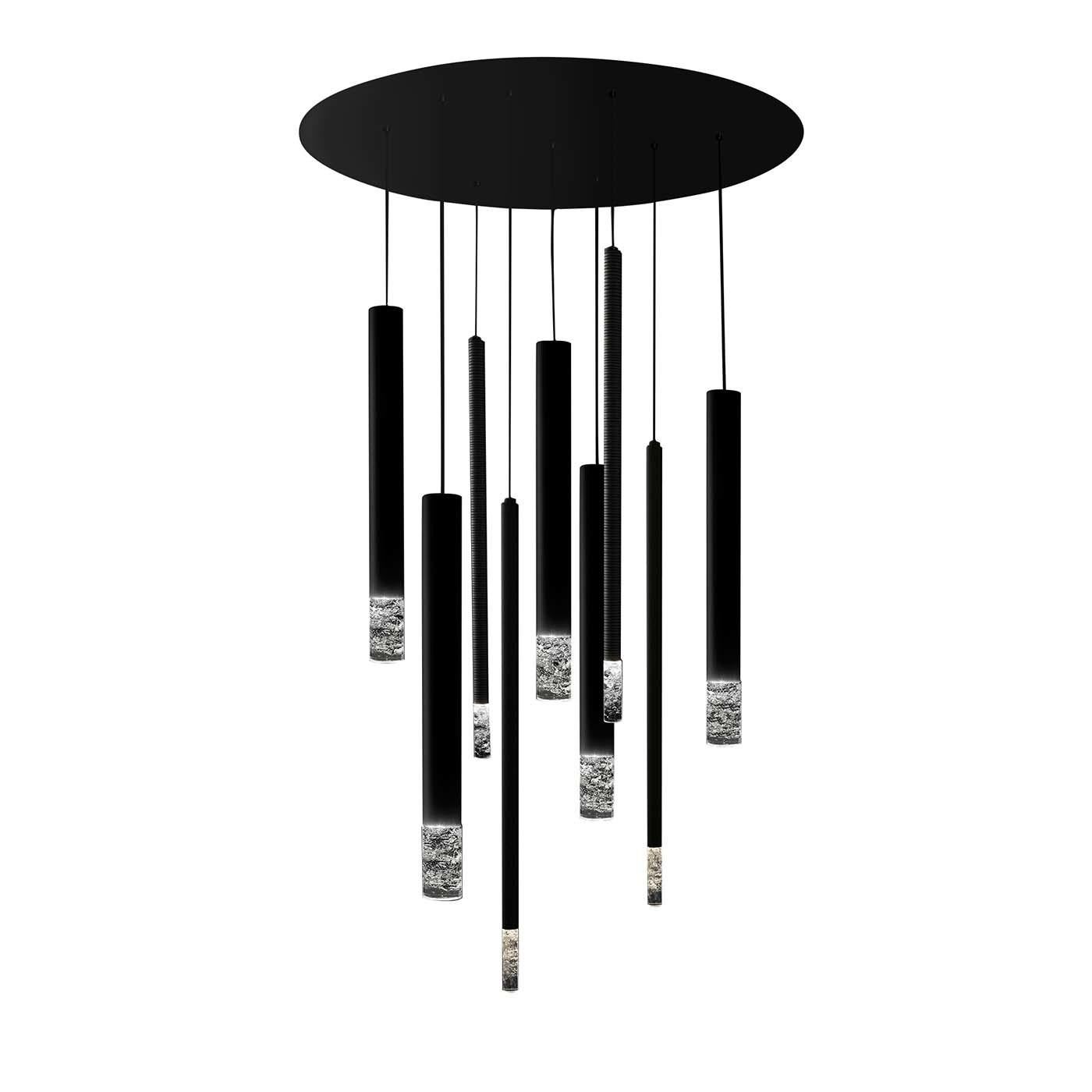 Included in the Ubo collection of unique elegant lamps with a modern design, the Ubi model features two pendant lamps suspended at different lengths from a round metal ceiling plate with a black matte finish. Each pendant measures 55 cm and is