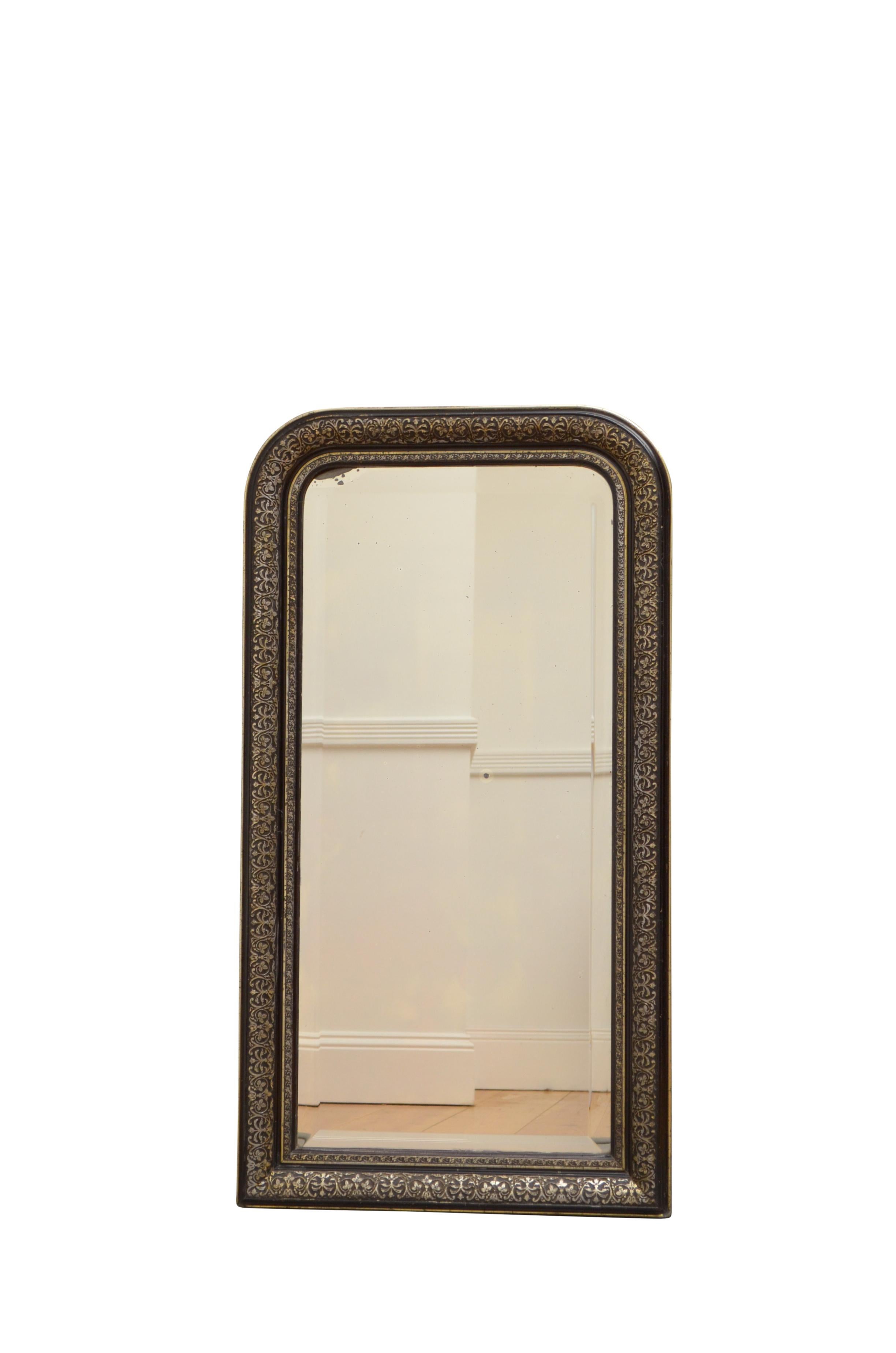 19th century wall mirror with original bevelled edge glass with some foxing in ebonised and gilded frame. This antique mirror retains its original glass and it is in wonderful condition, ready to place at home. c1880
Measures: H 41.5