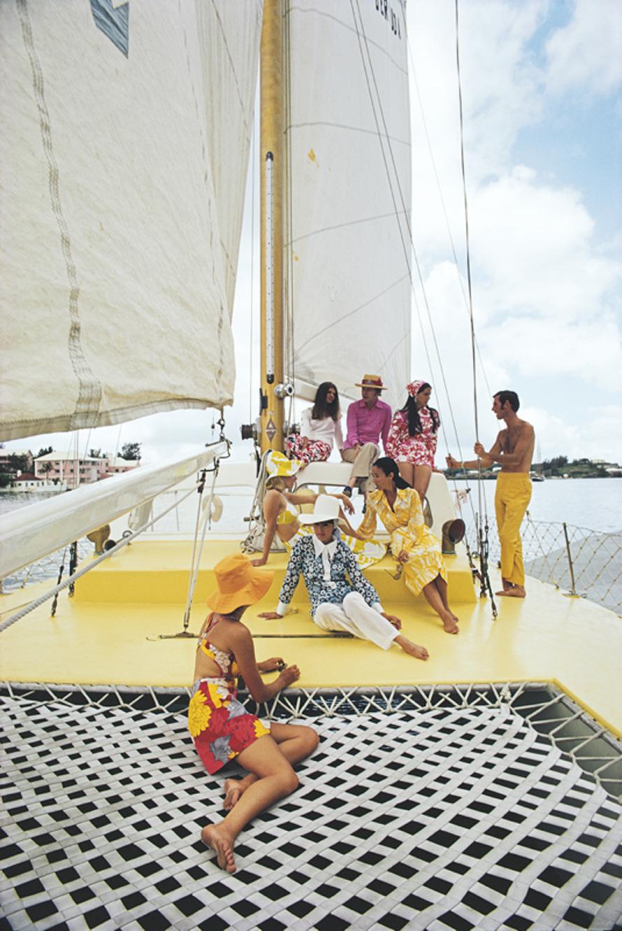 A Colourful Crew 
1970
by Slim Aarons

Slim Aarons Limited Estate Edition

A group of colourfully dressed friends on board the Calypso clothing store owned boat, Bermuda, June 1970. 

unframed
c type print
printed 2023
24 x 20"  - paper