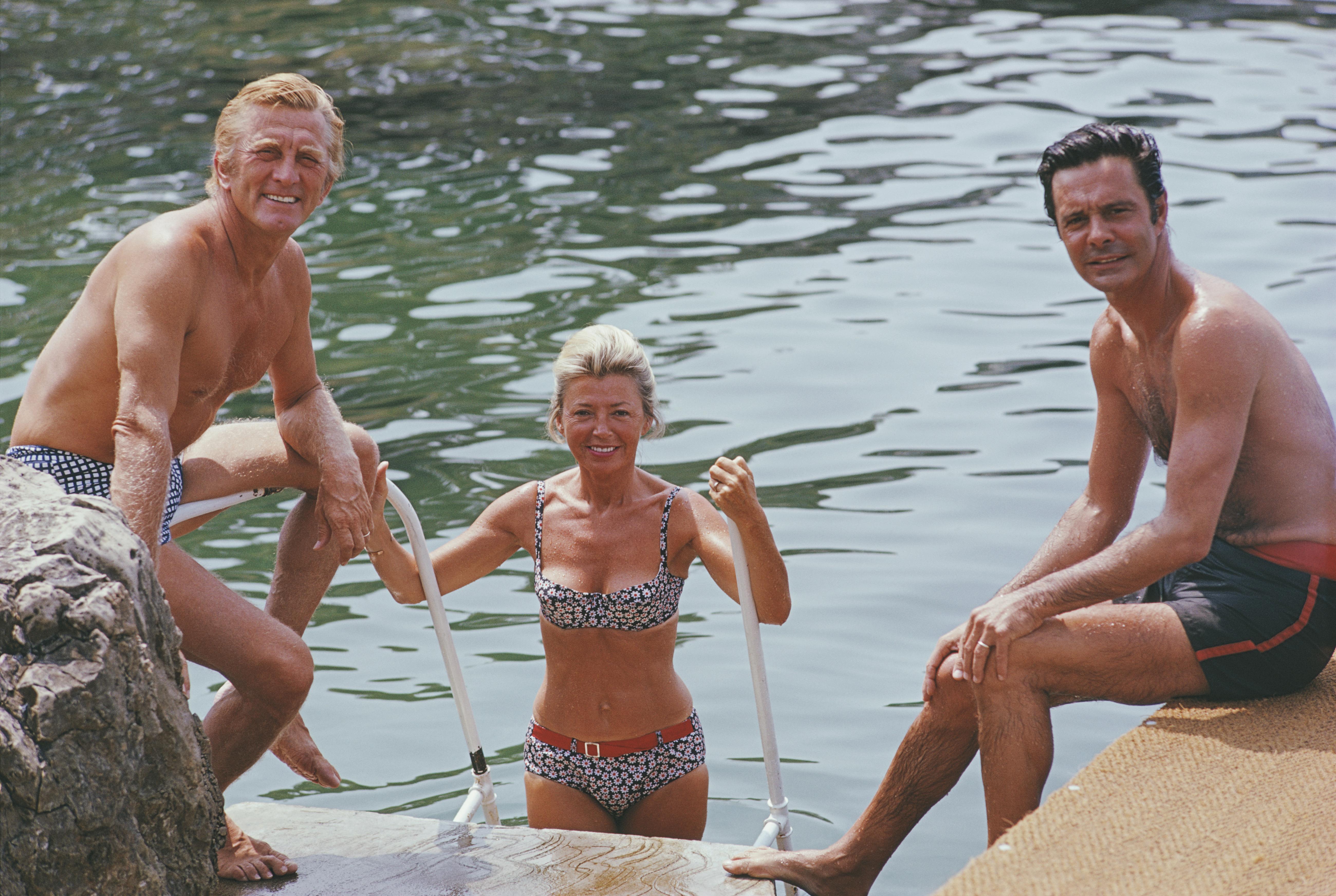 'Actors In Antibes' 1969 Slim Aarons Limited Estate Edition Print 

Actors Kirk Douglas (left), Louis Jourdan and Jourdan's wife Quiquie enjoying the water at the Hotel du Cap-Eden-Roc in Antibes on the French Riviera, August 1969. (Photo by Slim