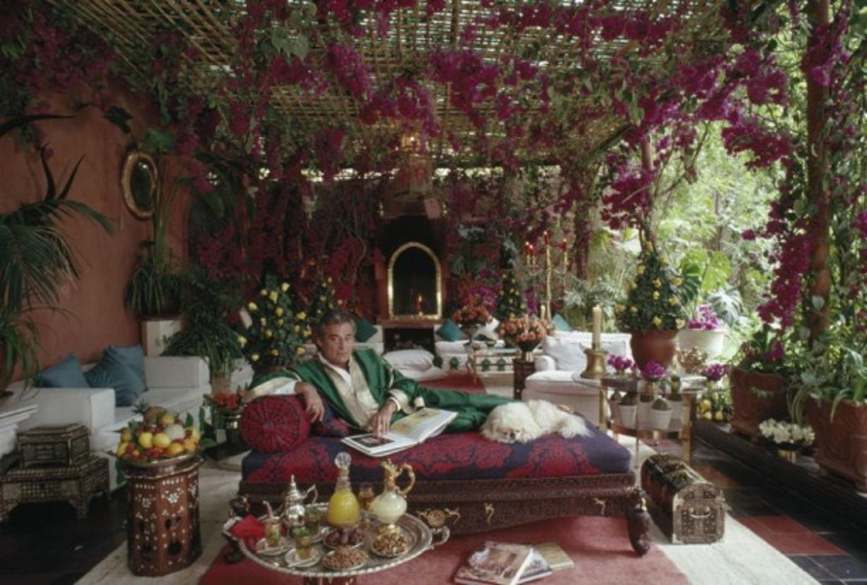 Adolfo De Velasco 
1988
by Slim Aarons

Slim Aarons Limited Estate Edition

Adolfo de Velasco relaxes on a verandah in Marrakech, April 1988

unframed
c type print
printed 2023
16 x 20" - paper size

Limited to 150 prints only – regardless of paper