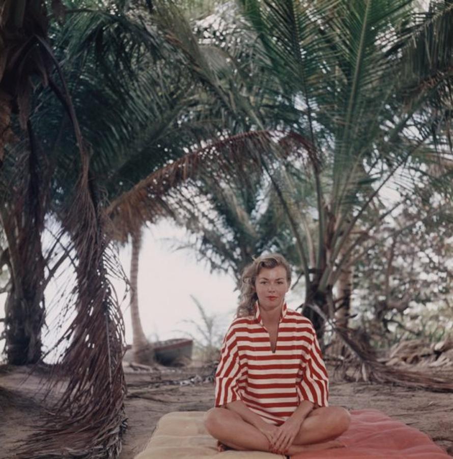 Andros Island 
1957
by Slim Aarons

Slim Aarons Limited Estate Edition

Marsha Gayle of Paris enjoys a deserted beach near Calabash Bay, Andros, Bahamas, 1957. 

unframed
c type print
printed 2023
16×16 inches - paper size


Limited to 150 prints