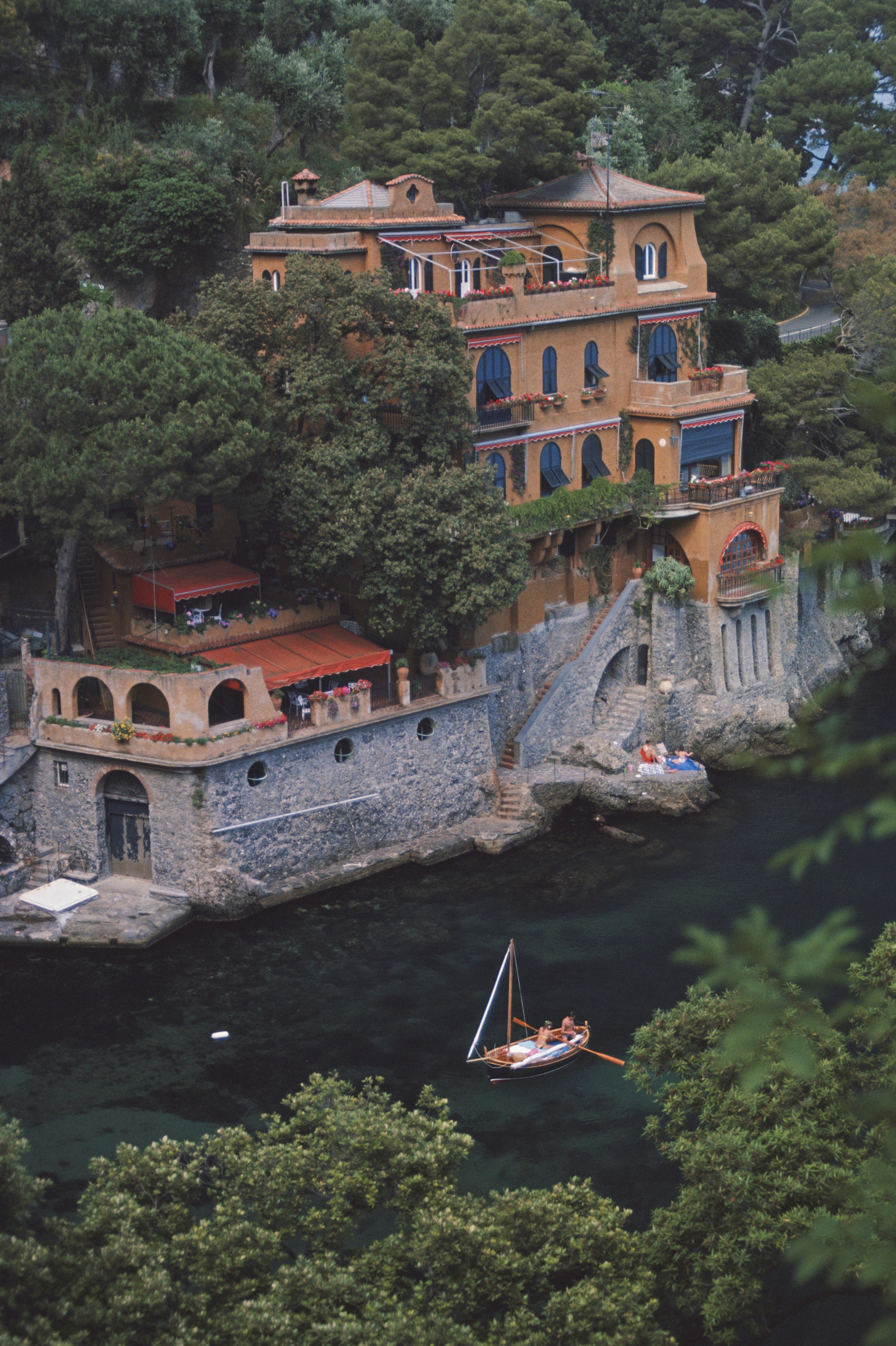 'Ardizzone's House' 1985 Slim Aarons Limited Estate Edition Print 

Overlooking Ardizzone's House, on the water's edge in Portofino, Italy, July 1985.

Produced from the original transparency
Certificate of authenticity supplied 
Archive