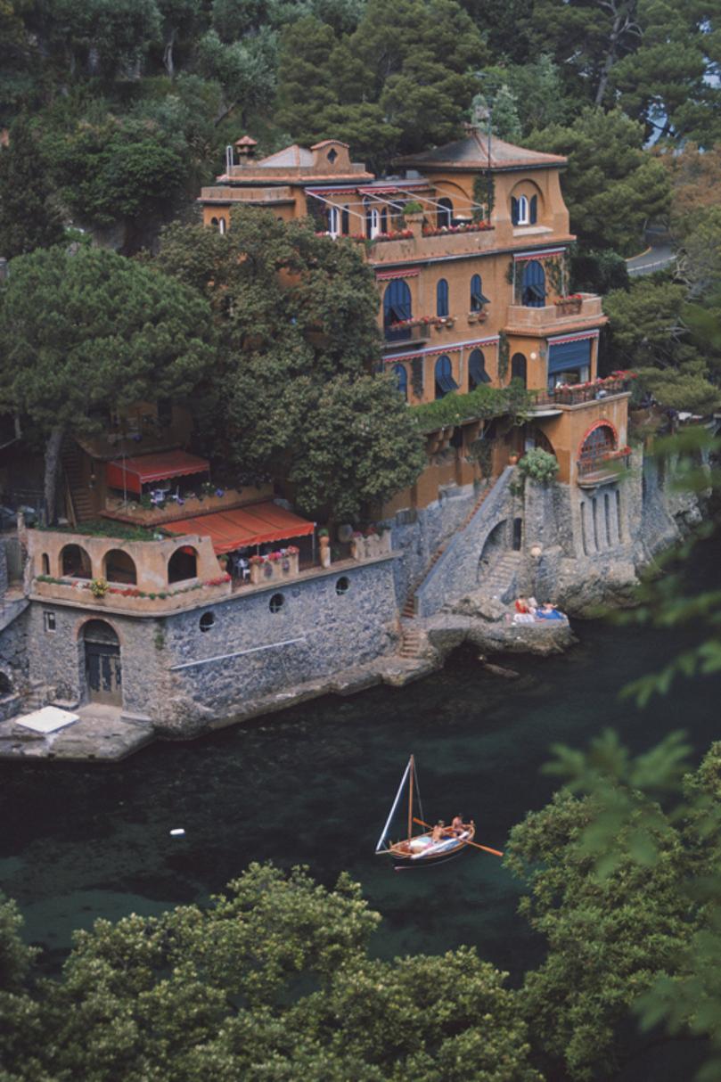 Ardizzone’s House 
1985
by Slim Aarons

Slim Aarons Limited Estate Edition

Overlooking Ardizzone’s House, on the water’s edge in Portofino, Italy, July 1985. 

unframed
c type print
printed 2023
20 × 16 inches - paper size


Limited to 150 prints