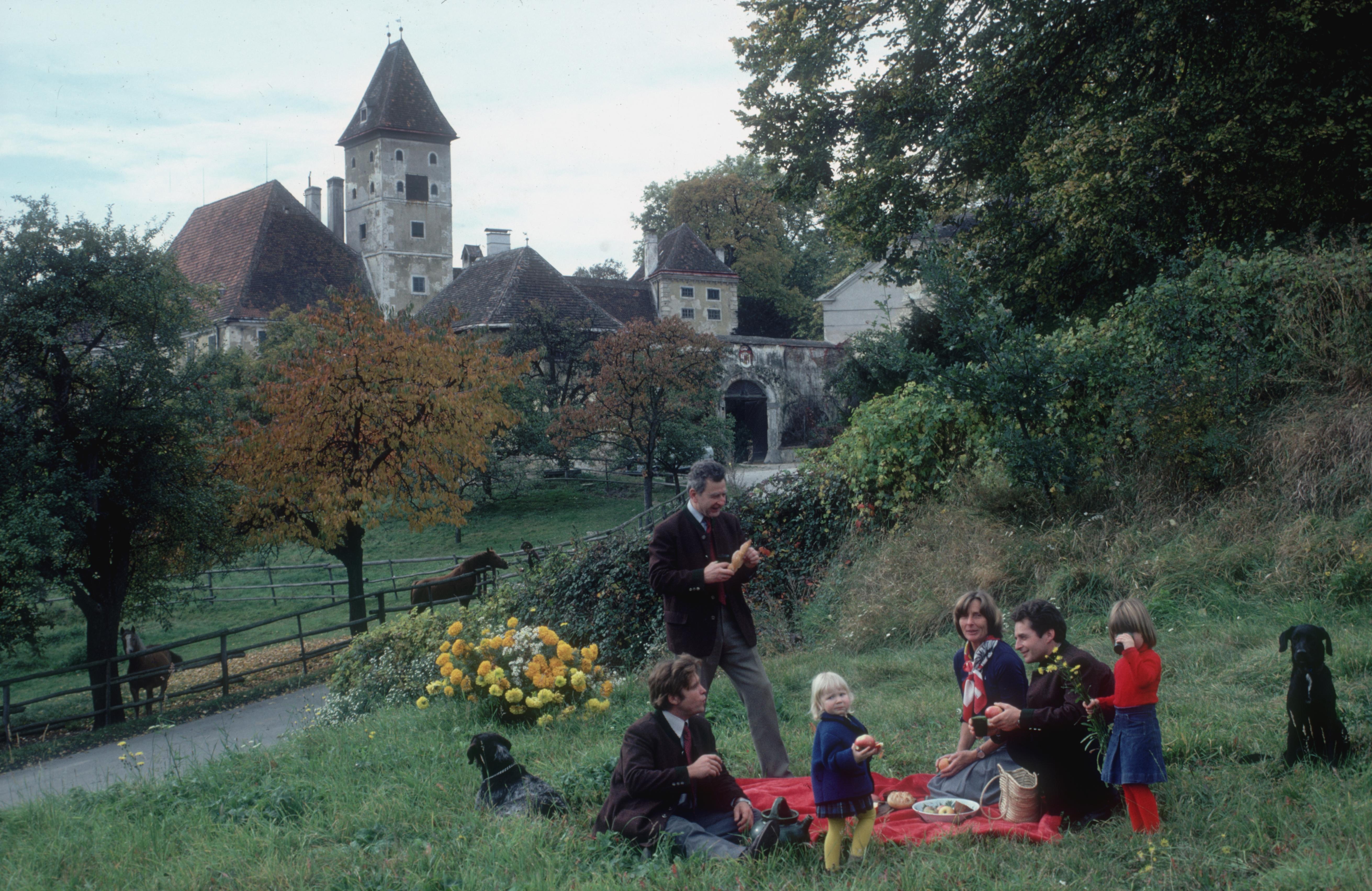 'Auersperg Picnic' 1979 Slim Aarons Limited Estate Edition Print 

1979, Prince Franz von Auersperg and his family on a picnic outside the family castle, Salzburg, Austria. 

Produced from the original transparency
Certificate of authenticity