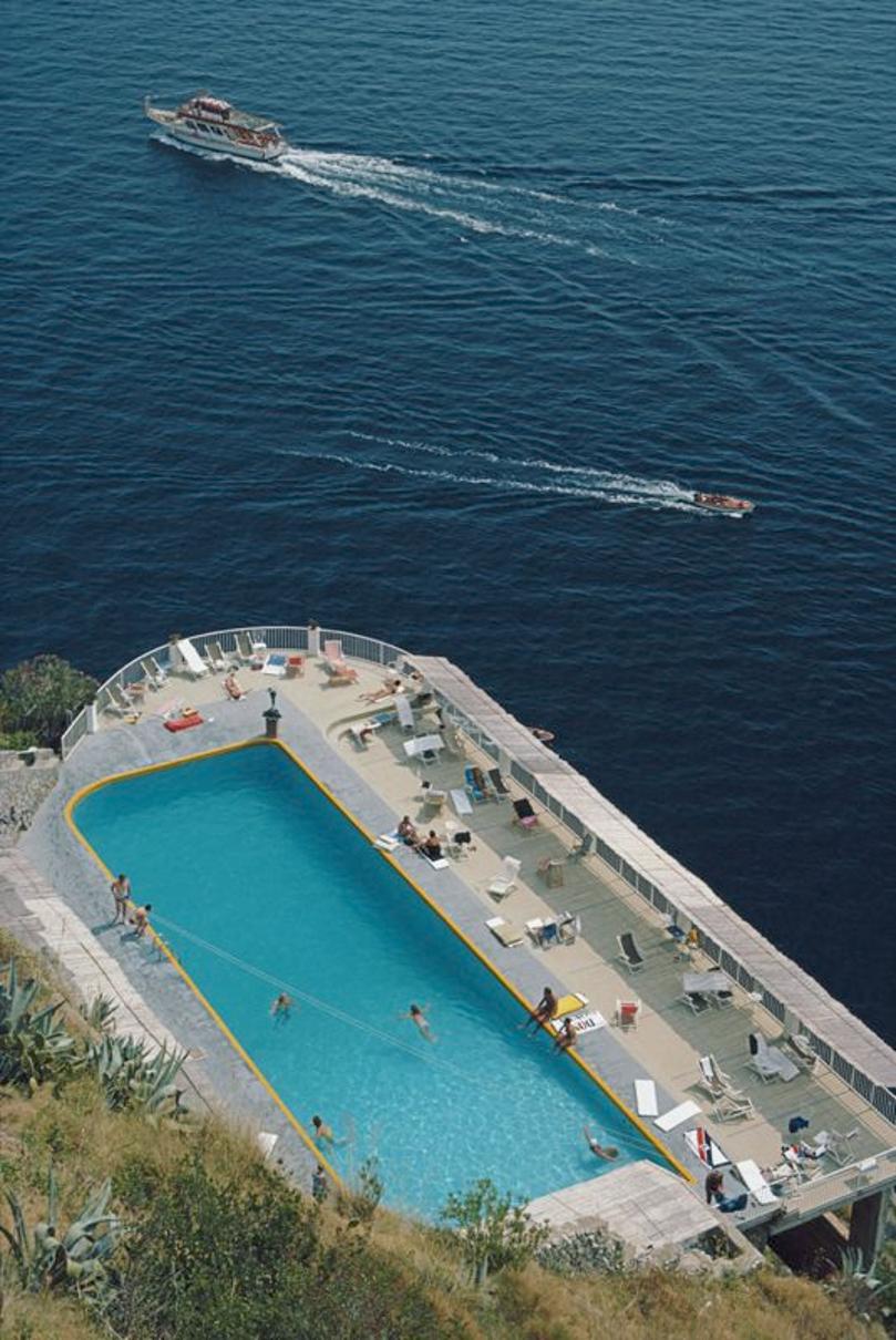 Belvedere Pool 
1984
by Slim Aarons

Slim Aarons Limited Estate Edition

The swimming pool at the Hotel Belvedere, Amalfi, Italy, August 1984.

unframed
c type print
printed 2023
16 x 20" - paper size

Limited to 150 prints only – regardless of