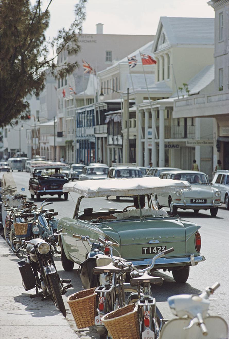 Bermuda Street Scene 
1967
by Slim Aarons

Slim Aarons Limited Estate Edition

Bicycles, motorcycles, and cars on a street in Bermuda, June 1967.

unframed
c type print
printed 2023
20 × 16 inches - paper size


Limited to 150 prints only –