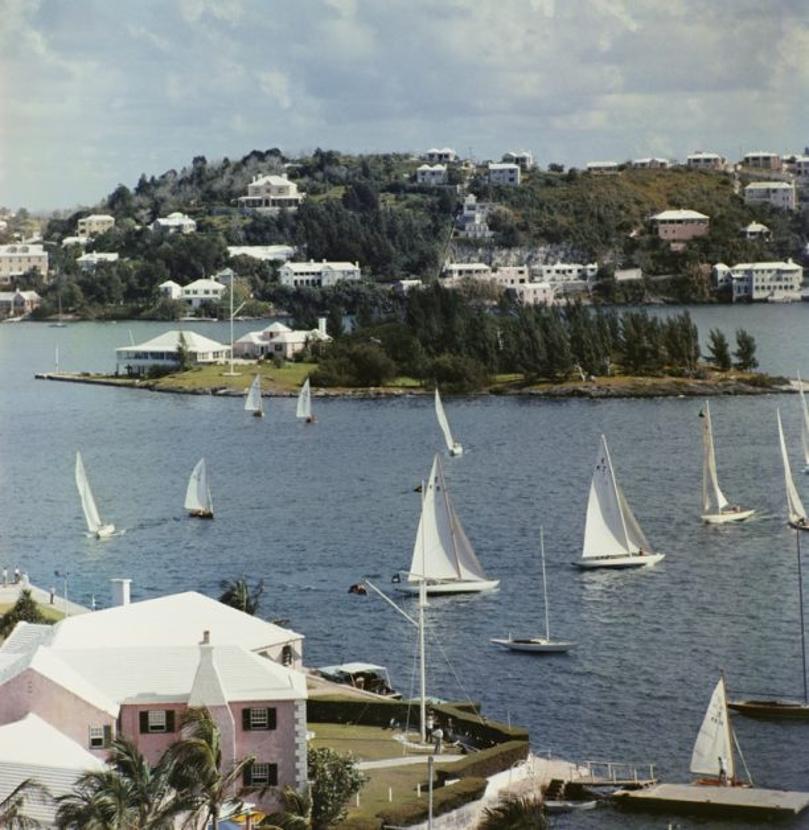 Bermuda View 
1957
by Slim Aarons

Slim Aarons Limited Estate Edition

View from the Bermudiana Hotel looking towards Paget, in the foreground the Royal Bermuda Yacht club, 1957. 

unframed
c type print
printed 2023
20 x 20"  - paper size


Limited