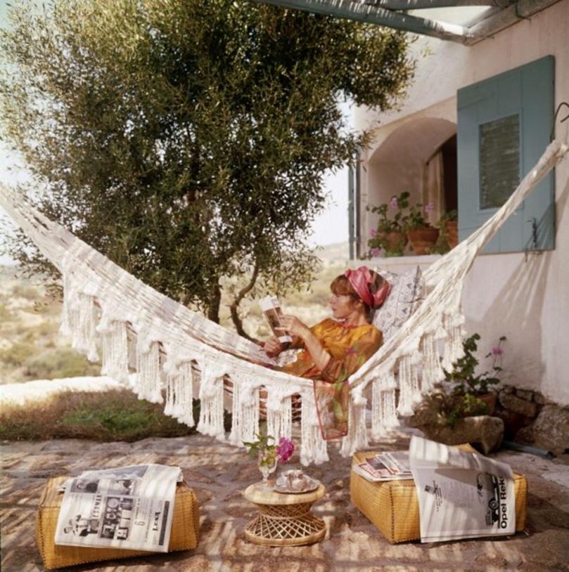 Bettina Graziani 
1964
by Slim Aarons

Slim Aarons Limited Estate Edition

Bettina Graziani relaxes in a hammock on the Costa Smeralda, Sardinia, 1964.

unframed
c type print
printed 2023
20 x 20"  - paper size


Limited to 150 prints only –
