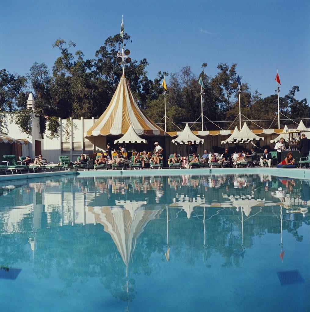 Beverly Hills Hotel 1957

Slim Aarons Limited Estate Stamped Edition 

Sunshades and sun loungers by the swimming pool at The Beverly Hills Hotel, Beverly Hills, California, 1957. 

Produced from the original transparency
Certificate of authenticity
