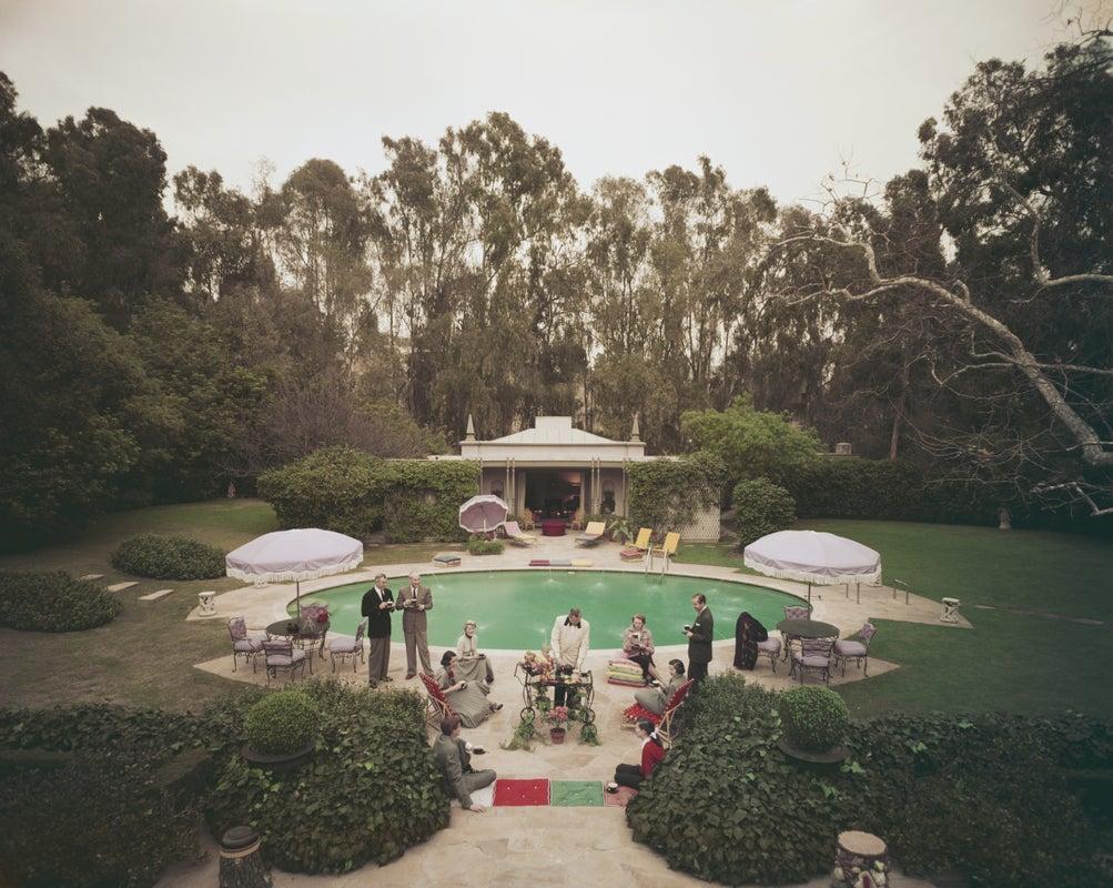 'Beverly Hills Pool Party' 1952 Slim Aarons Limited Estate Edition Print 

Premium Rates Apply. A party by James Pendleton's pool in Beverly Hills, California, 1952. Pendleton's house was later bought by Hollywood director Robert Evans and appeared