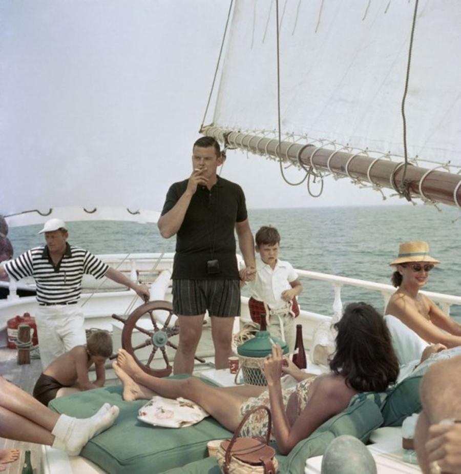 Black Pearl Trippers 
1960
by Slim Aarons

Slim Aarons Limited Estate Edition

 Harry Cabot Jnr (standing, centre) with his son and their host Barclay (Buzzy) H Warburton III (in striped shirt) aboard the brigantine ‘Black Pearl’, circa 1960. They