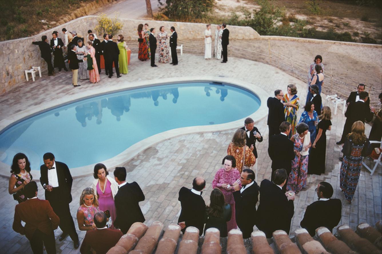Black Tie Poolside 
1973
by Slim Aarons

Slim Aarons Limited Estate Edition

A formal party by a swimming pool in the Algarve, Portugal, June 1973.

unframed
c type print
printed 2023
16×20 inches - paper size


Limited to 150 prints only –