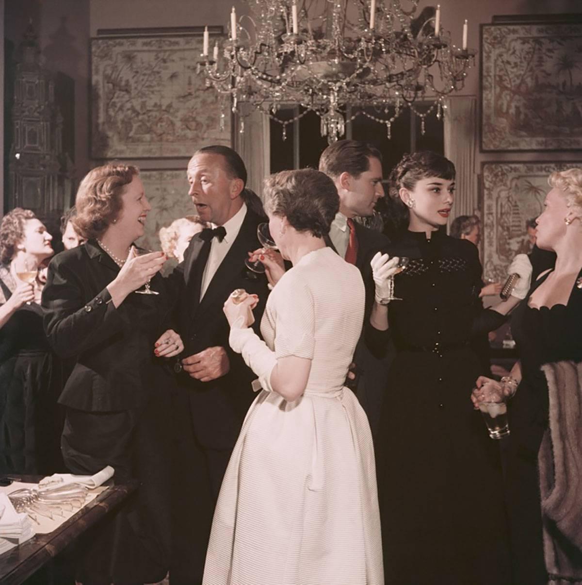 Slim Aarons Color Photograph - Californian Party, Audrey Hepburn
