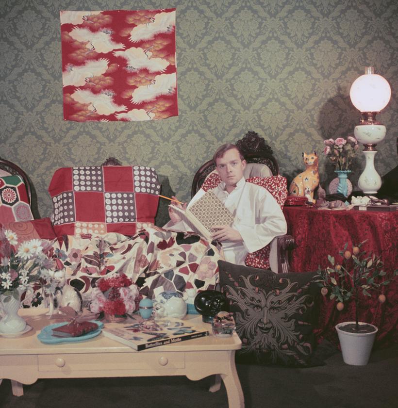 Capote At Home 

1958

Author Truman Capote (1924 – 1984) relaxes with a book and a cigarette in his cluttered apartment, Brooklyn Heights, New York. 1958.

Photo by Slim Aarons

12 x 12” / 30 x 30 cm paper size 
Archival pigment print
unframed