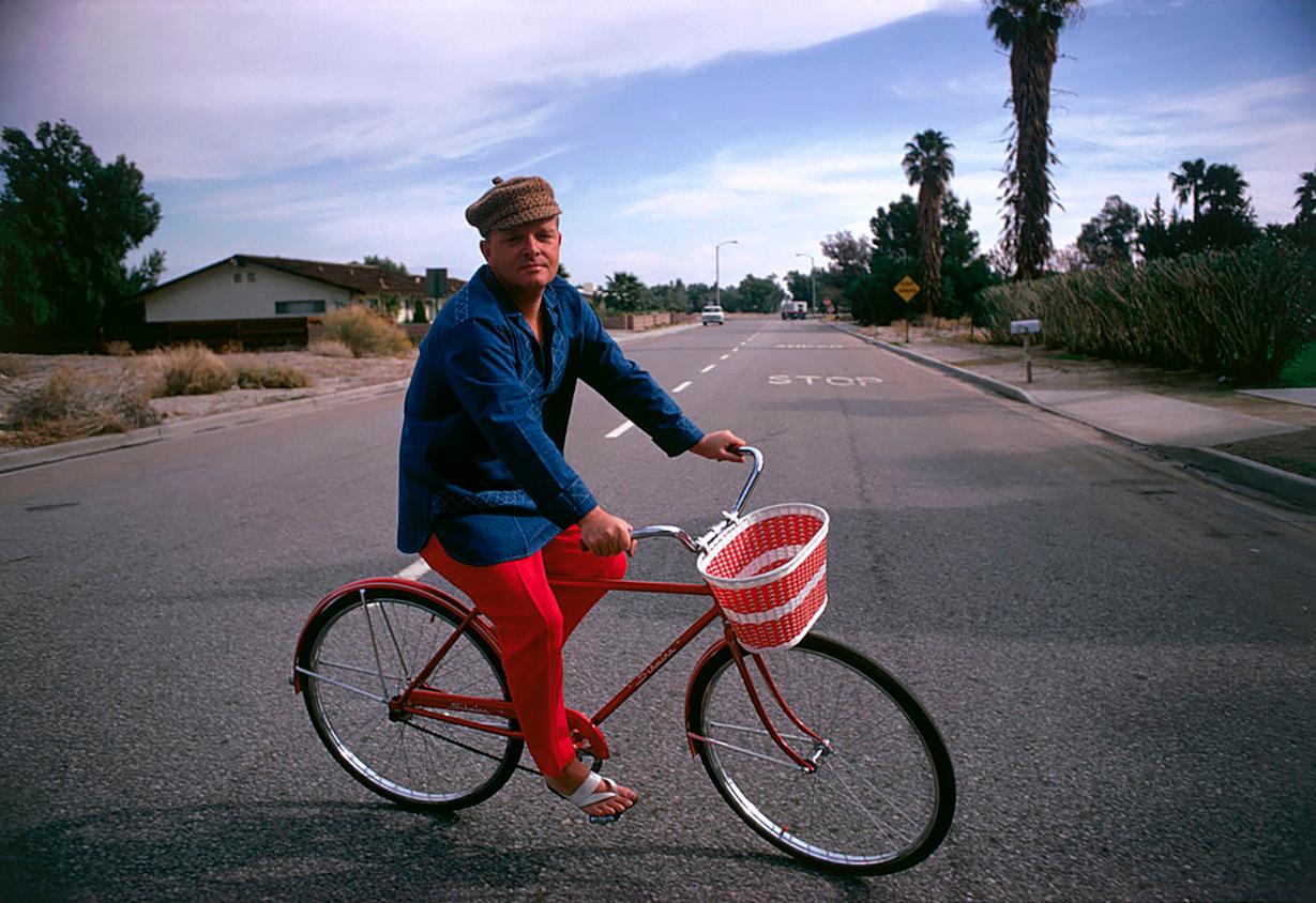 Slim Aarons - Capote Cycling, Slim Aarons Estate Edition For Sale at 1stDibs