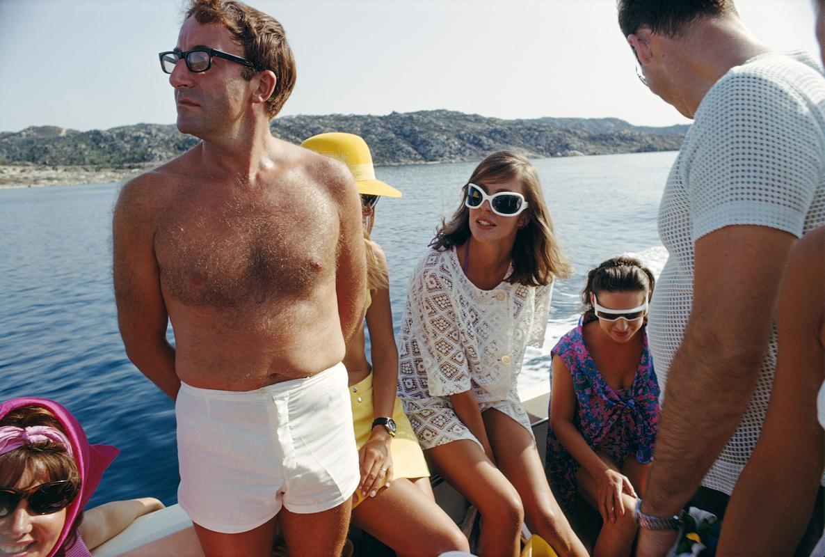 'Celebrity Cruise'  

British comedian Peter Sellers (1925 - 1980) holidays with Princess Margaret (1930 - 2002, right) on the Aga Khan's yacht on the Costa Smeralda, circa 1955.

Gorgeous print measuring  20 x 24 inches / ca 51 x 61 cm's.
 
Estate