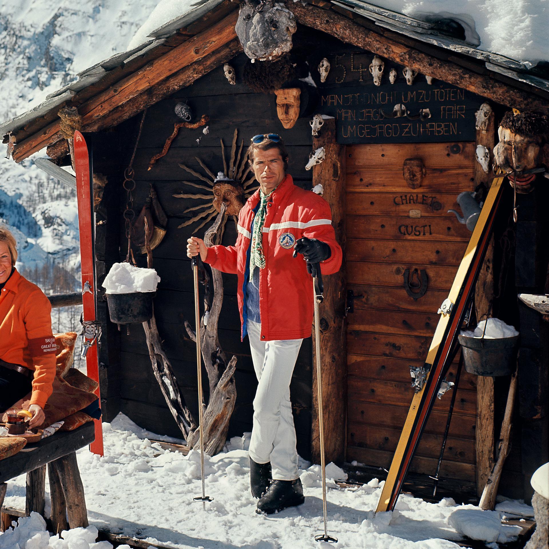 Chalet Costi, Zermatt, Estate Edition, Winter Landscape Photograph

This late 1960s landscape photograph, captured by society photographer Slim Aarons, features skiers outside the Chalet Costi in Zermatt, 1968.

This is an estate stamped and hand