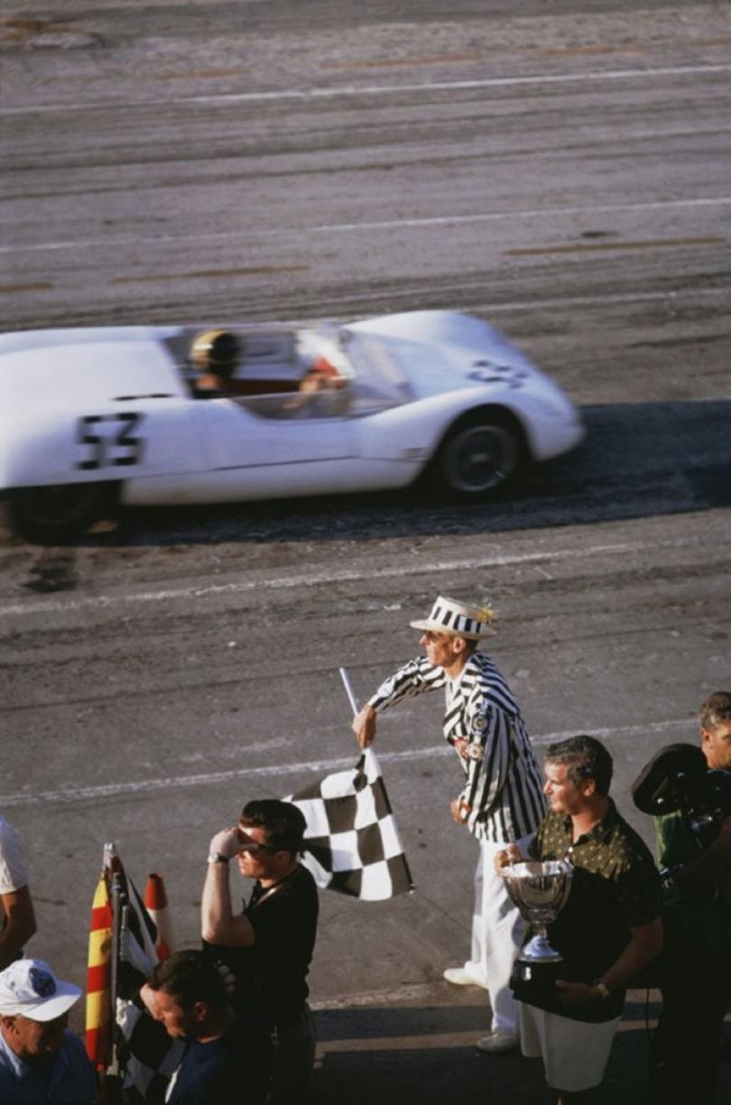 Checkered Flag 
1963
by Slim Aarons

Slim Aarons Limited Estate Edition

 The checkered flag signals the end of the race during the 1963 Nassau Speed Week. 

unframed
c type print
printed 2023
16×20 inches paper size

Limited to 150 prints only –