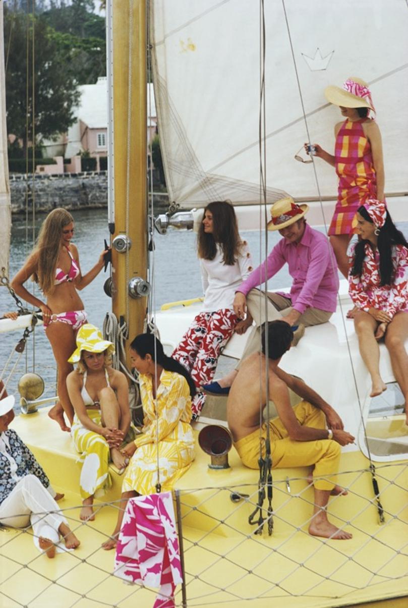Colourful Crew 
1970
by Slim Aarons

Slim Aarons Limited Estate Edition

A group of colourfully dressed holidaymakers on a yacht, Bermuda, June 1970

unframed
c type print
printed 2023
20 × 16 inches - paper size


Limited to 150 prints only –