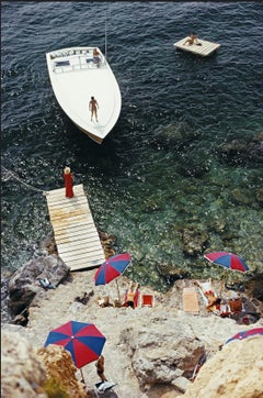 Coming Ashore, Slim Aarons - 20th century photography, Waterfront, Speedboat