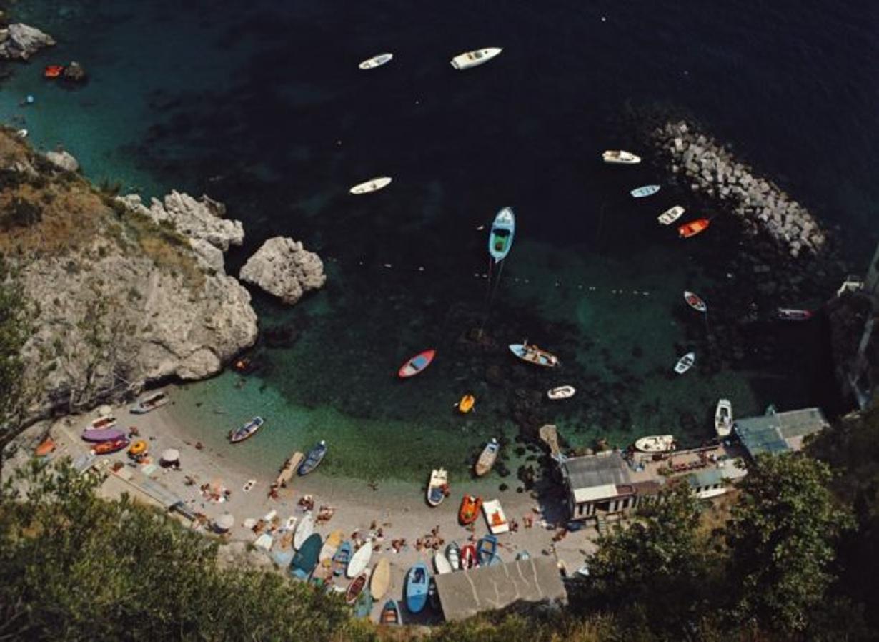 Conca dei Marini 
1984
by Slim Aarons

Slim Aarons Limited Estate Edition

A busy bay in Conca dei Marini, on the Amalfi coast in Italy, August 1984

unframed
c type print
printed 2023
20 x 24"  - paper size

Limited to 150 prints only – regardless