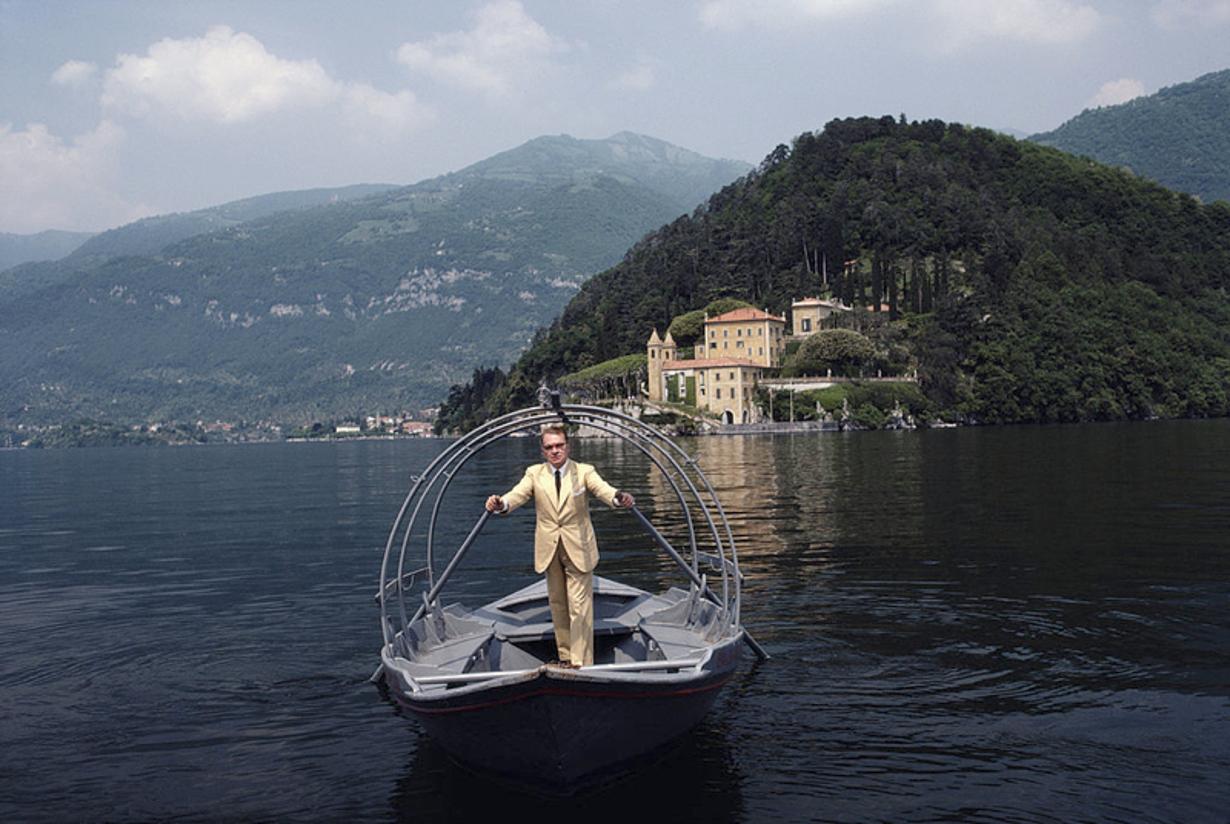 Count Guido Monzino 
1983
by Slim Aarons

Slim Aarons Limited Estate Edition

Italian mountain climber and explorer Count Guido Monzino (1928-1988) rowing on the waters of Lake Como towards his home, Villa del Balbianello, Lenno, Italy, in June