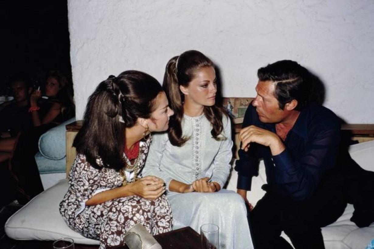 Crespi And Mastroianni 
1968
by Slim Aarons

Slim Aarons Limited Estate Edition

Italian countess Consuelo Crespi (left, 1928-2010) and Italian actor Marcello Mastroianni (right, 1924-1996) in conversation with a third woman in Costa Smeralda,