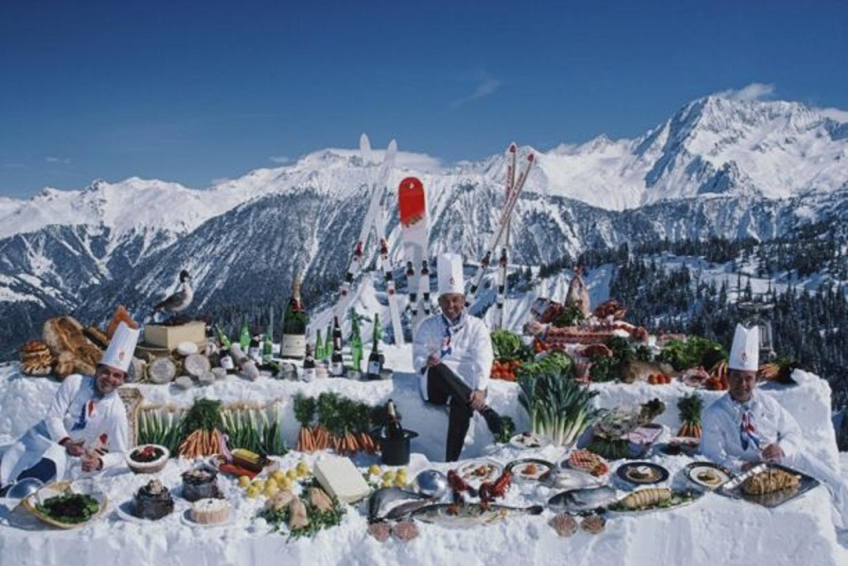 Culinary Heights 
1987
by Slim Aarons

Slim Aarons Limited Estate Edition

Courchevel restaurant chefs Jean Jacob (left) of ‘Le Bateau Ivre’, Michel Rochedy (centre) of ‘Le Chabichou’, and Albert Parveaux of ‘Pralong 2000’, Courchevel, France, April