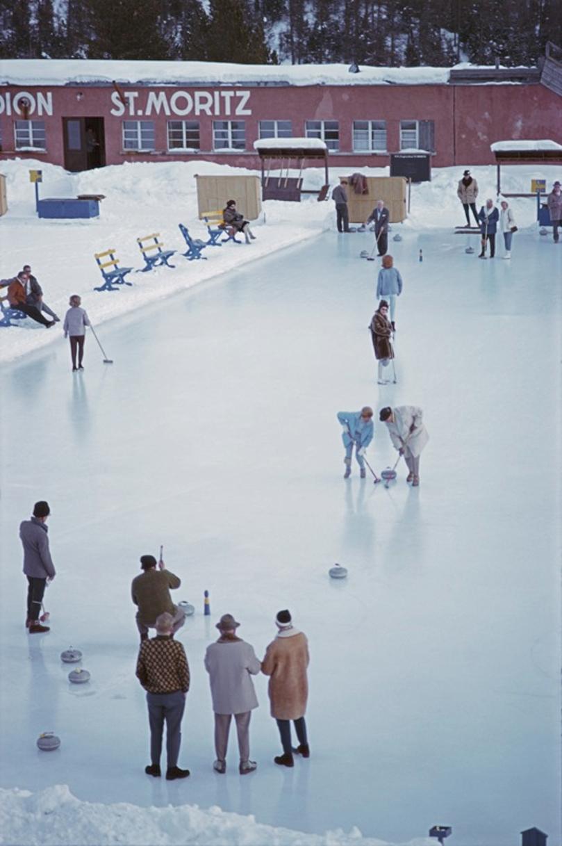 Curling At St. Moritz 
1963
by Slim Aarons

Slim Aarons Limited Estate Edition

Curlers on a rink, or curling sheet, in St Moritz, Switzerland, March 1963

unframed
c type print
printed 2023
20 × 16 inches - paper size


Limited to 150 prints only –