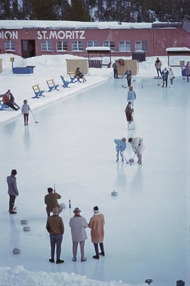Curling In St Moritz 
1963
by Slim Aarons

Slim Aarons Limited Estate Edition

Curlers on a rink, or curling sheet, in St Moritz, Switzerland, March 1963.

unframed
c type print
printed 2023
16 x 20" - paper size

Limited to 150 prints only –