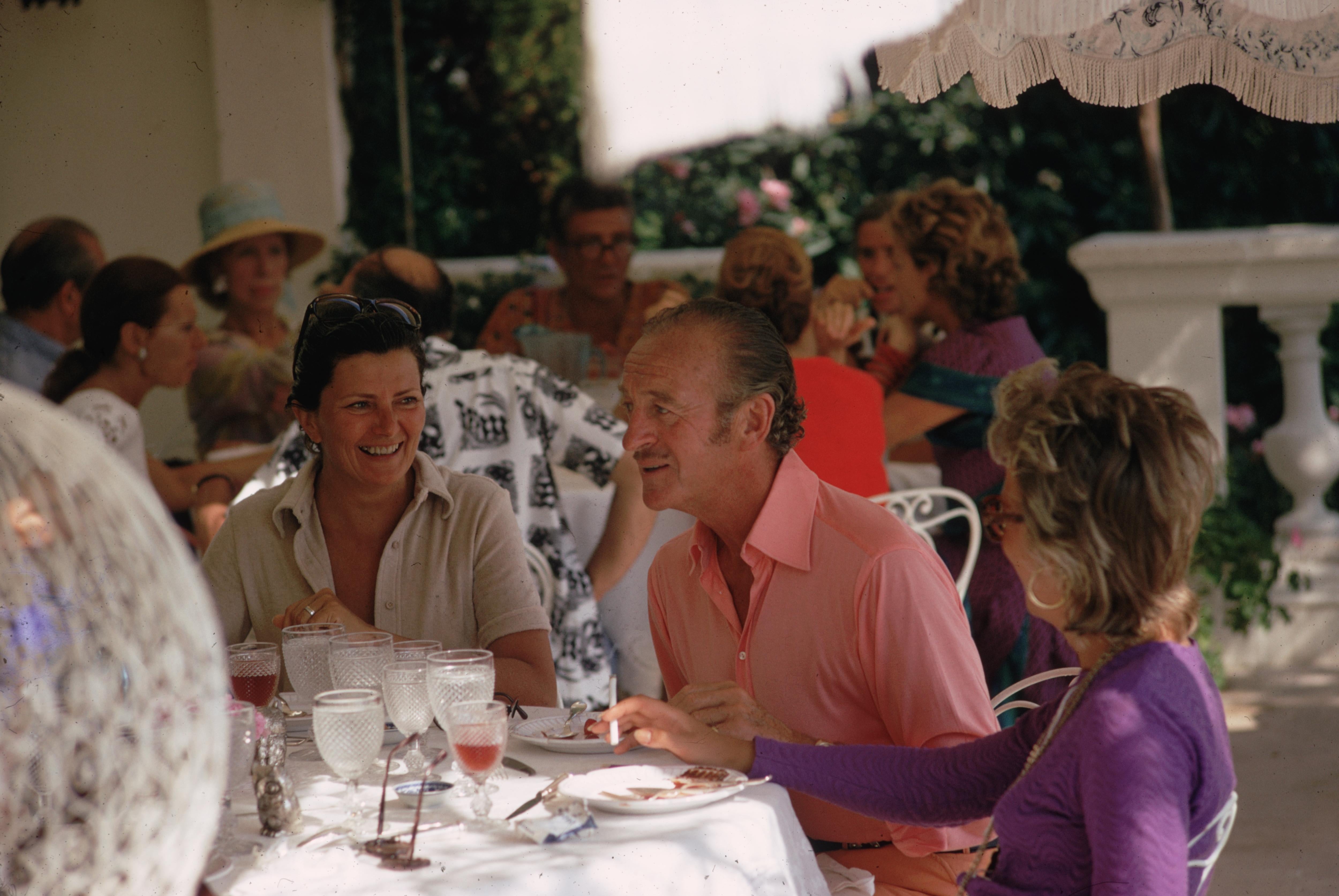 'David Niven' 1970 Slim Aarons Limited Estate Edition Print 

August 1970: Actor David Niven (1910 - 1983) relaxing with friends in Monte Carlo.

Produced from the original transparency
Certificate of authenticity supplied 
Archive stamped

Paper