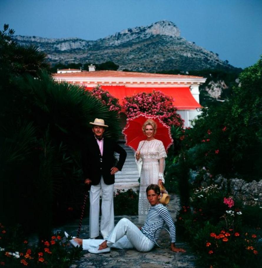 De Rosieres Family 
1975
by Slim Aarons

Slim Aarons Limited Estate Edition

Viscount and Viscountess Paul de Rosiere outside a villa in Monte Carlo, August 1975. 

unframed
c type print
printed 2023
20 x 20"  - paper size


Limited to 150 prints