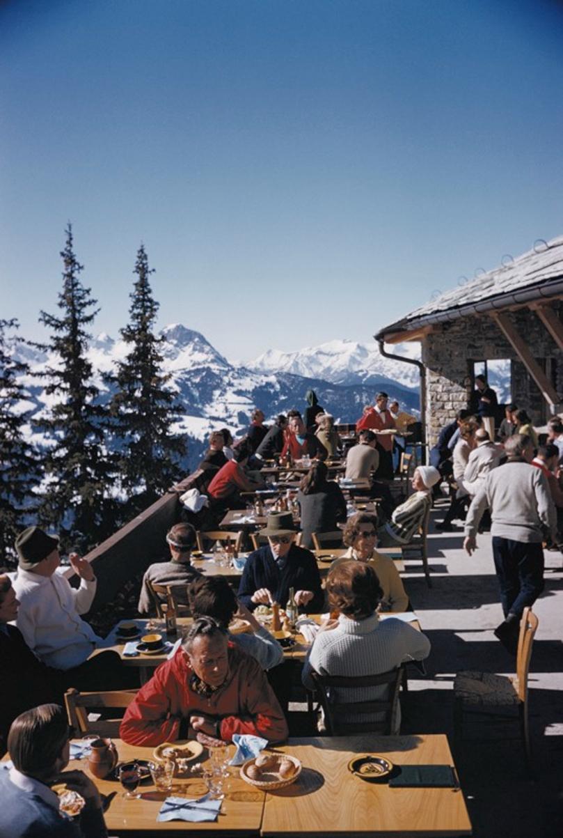 Dining In Gstaad 
1961
by Slim Aarons

Slim Aarons Limited Estate Edition

Holidaymakers at a ski lodge at Gstaad, Switzerland, March 1961.

unframed
c type print
printed 2023
20 × 16 inches - paper size


Limited to 150 prints only – regardless of