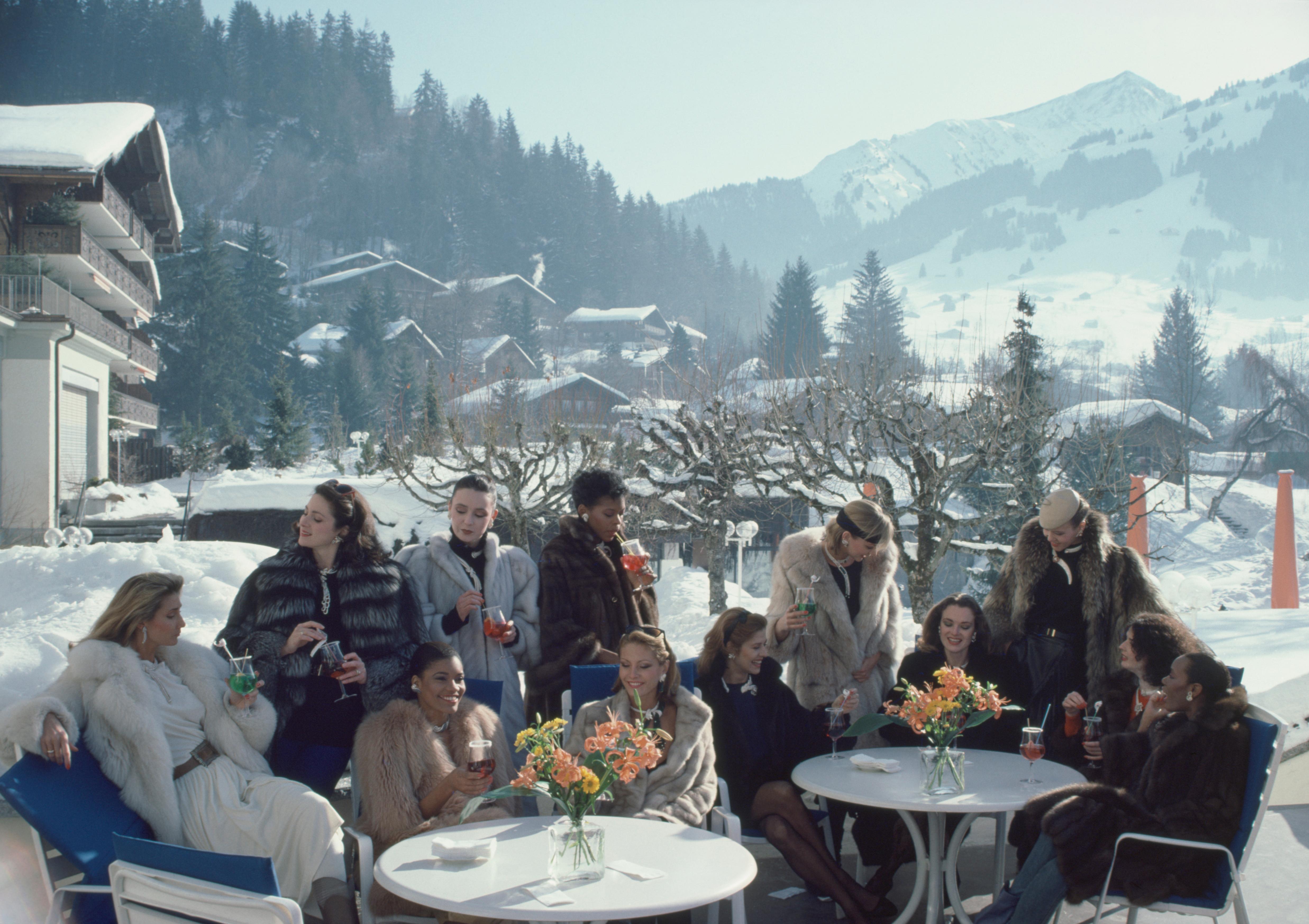 'Drinks At Gstaad' 1984 Slim Aarons Limited Estate Edition Print 

Models from Parisian jeweller M. Gerard enjoying drinks on the terrace of The Palace Hotel in Gstaad, Switzerland, 1984.

Produced from the original transparency
Certificate of
