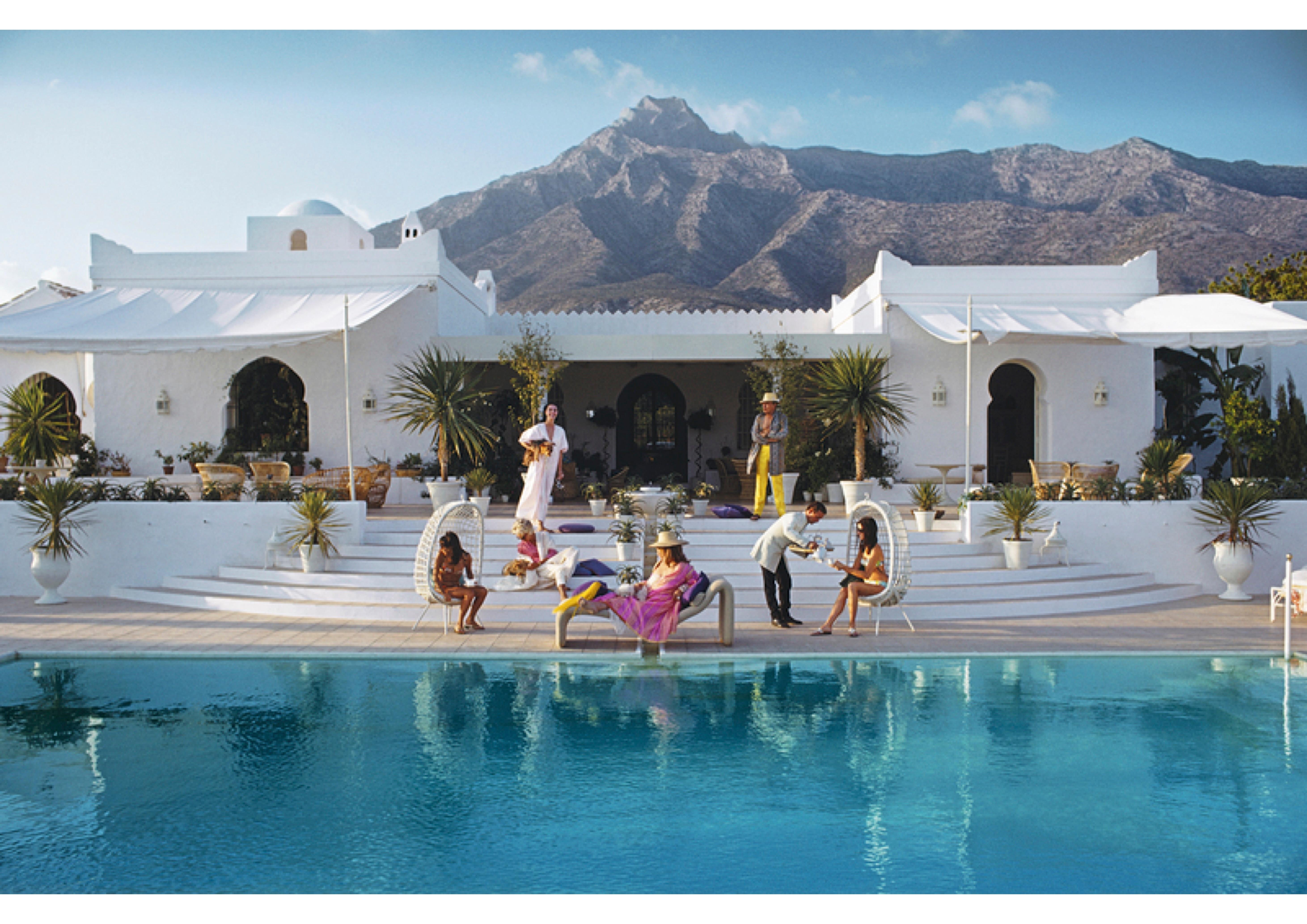 El Venero 1967

El Venero, the Moorish villa of Hector and Chico de Ayala in Marbella, Spain.

60 x 40" inches / 152 x 101 cm paper size.

Estate Stamped Collection Edition to 150 

Photo by Slim Aarons

Printed in 2025

Limited to 150 prints only