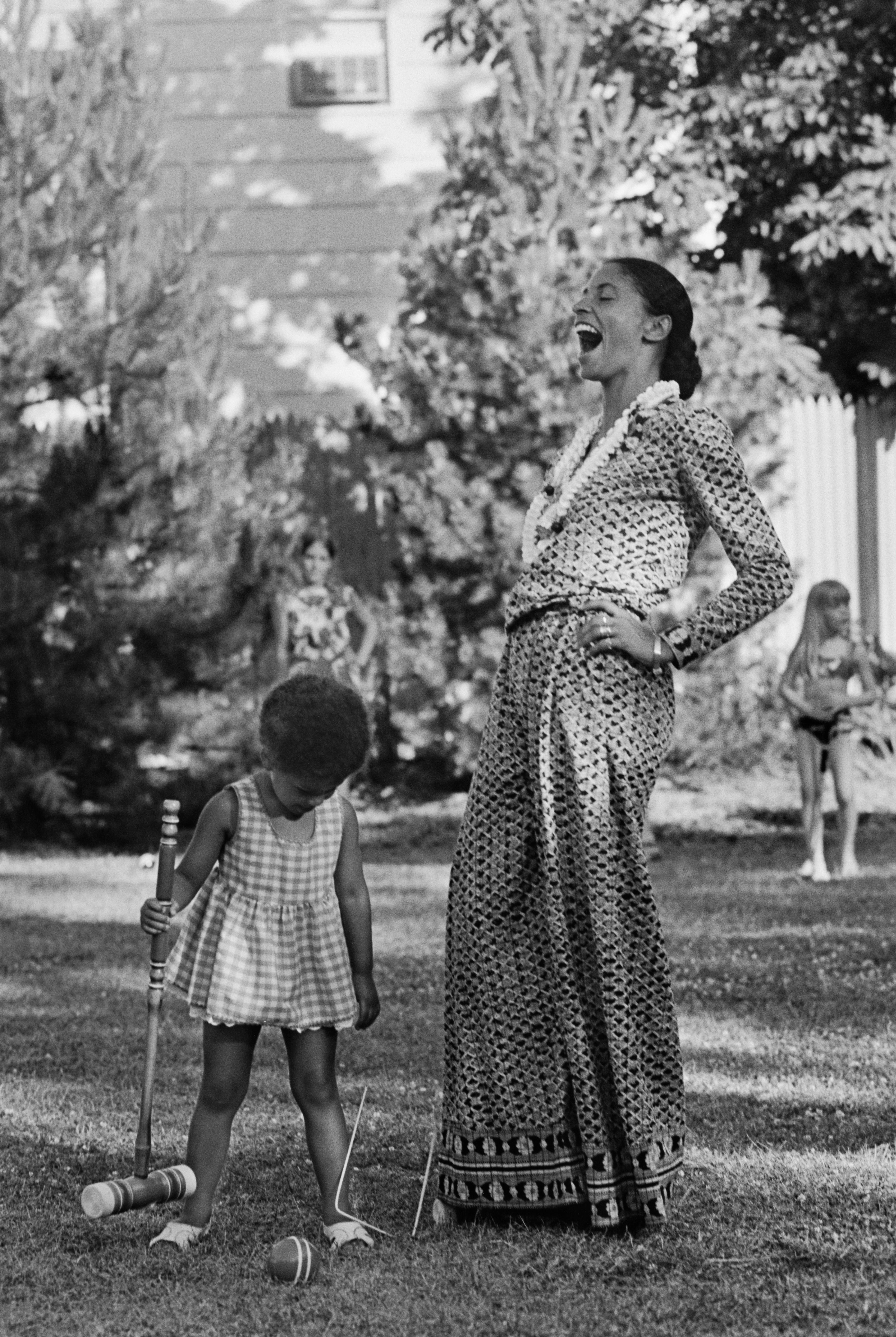 Slim Aarons Black and White Photograph - Elizabeth Campbell Parks and Leslie, her daughter with Gordon Parks, NY