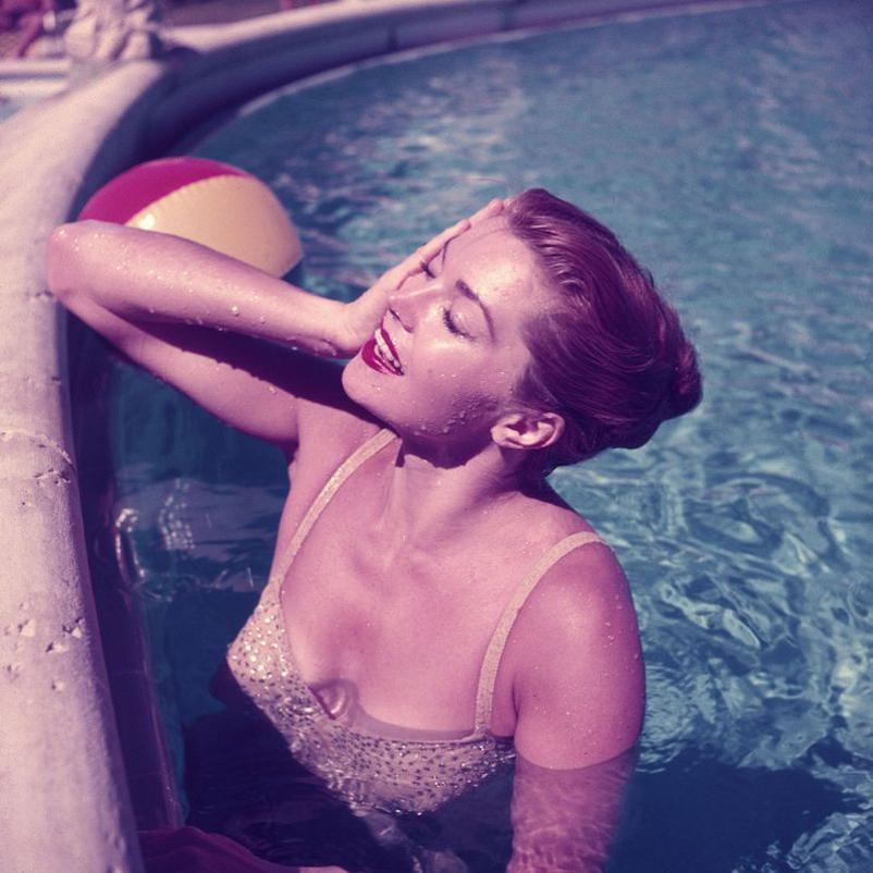 Esther Williams 
1955
by Slim Aarons

Slim Aarons Limited Estate Edition

Esther Williams, American aquatic actress and former swimming champion, relaxing in a Florida swimming pool.

unframed
c type print
printed 2023
20 x 20"  - paper