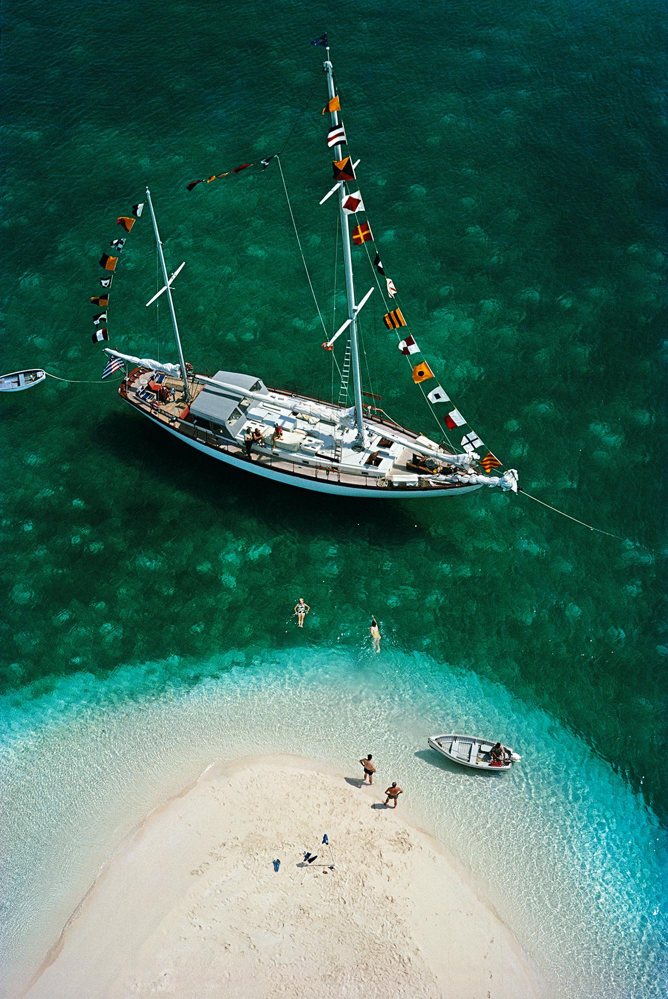 'Exuma Holiday' 

A yachting holiday on Exuma in the Bahamas, April 1964.

Paper Size  24x20 inches / 60 x 50 cm 
 
Estate Stamped Collection Edition to 150 

Photo by Slim Aarons

Printed in 2025

Limited to 150 prints only (regardless of paper
