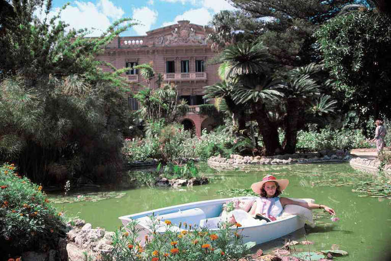 Donna Fabrizia Lanza di Mazzarino relaxing in a boat on a small lake in the grounds of the Villa Tasca d'Almerita in Sicily, Italy, in October 1984. Printed Later.

Estate stamped and hand numbered edition of 150 with certificate of authenticity
