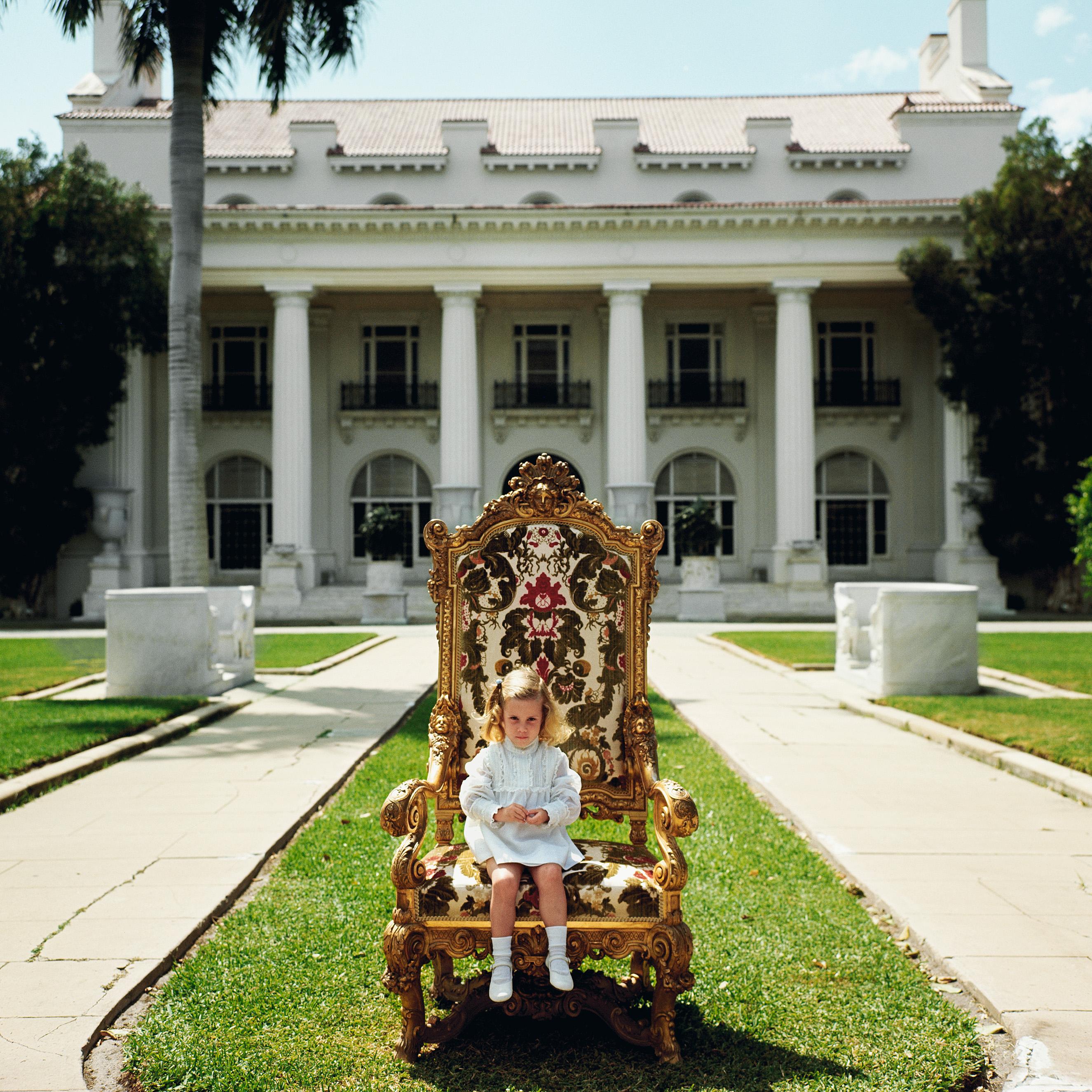 Family Chair

Elizabeth Matthews, descendant of H M Flagler co-founder of Palm Beach, sits in her great-grandfather’s favourite chair in front of the family mansion now the Flagler Museum, Palm Beach, April 1968.

Gorgeous print measuring 40 x 40