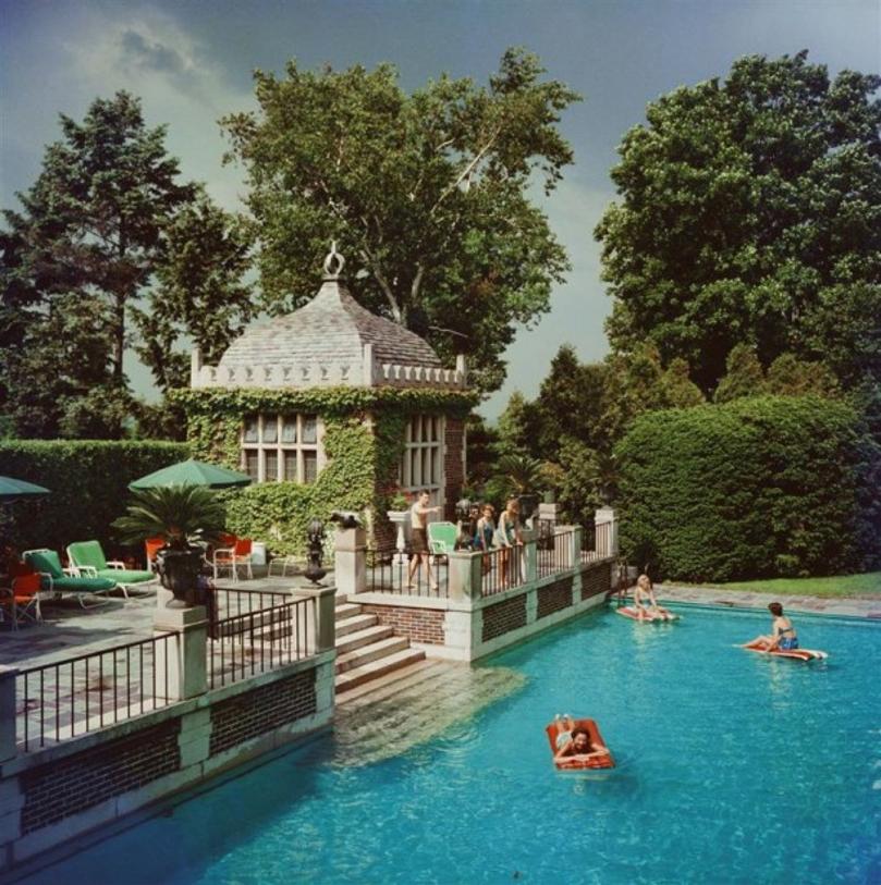 Family Pool 
1960
by Slim Aarons

Slim Aarons Limited Estate Edition

Mrs A Watson Armour III (Jean Schweppe) with friends and family enjoying the pool on their estate at Lake Forest, Illinois. A Wonderful Time – Slim Aarons

unframed
c type