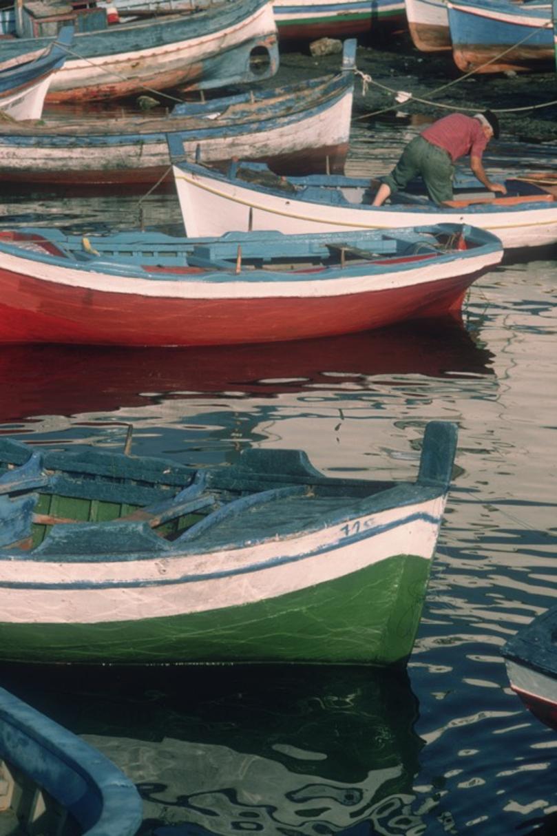 Fishing Boats 
1975
by Slim Aarons

Slim Aarons Limited Estate Edition

A fisherman in his boat at a Sicilian harbour, 1975. 

unframed
c type print
printed 2023
24 x 20"  - paper size

Limited to 150 prints only – regardless of paper size

blind