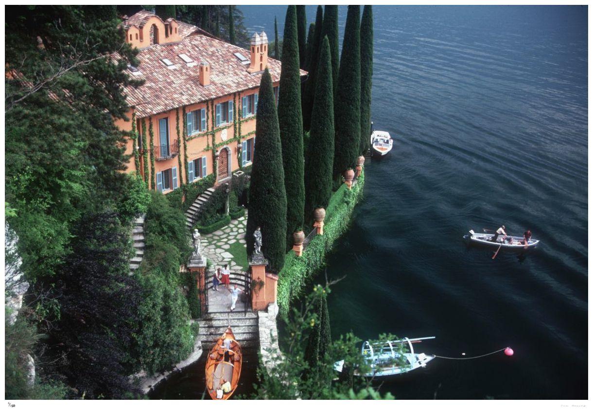 Giacomo Montegazza

1983

Giacomo and Stefania Montegazza welcome guests arriving by boat at their villa, La Casinella, on Lake Como, 1983.

By Slim Aarons

30x20” / 76x51 cm - paper size 
C-Type Print
unframed 

Estate Stamped Edition 
Edition of