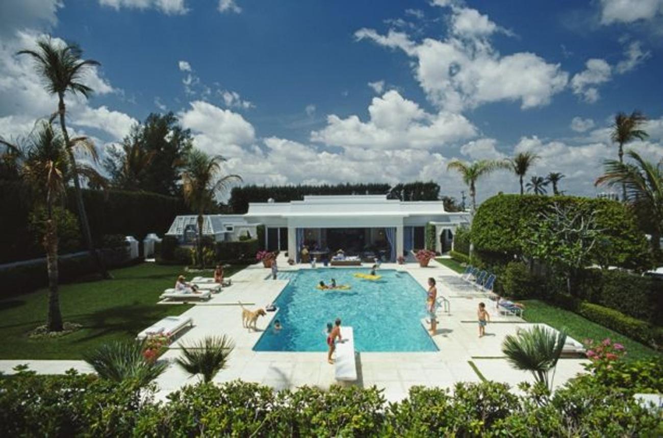 Goodman’s Pool 
1985
by Slim Aarons

Slim Aarons Limited Estate Edition

Family and friends in and around the pool at the home of Murray H. Goodman and his wife, Palm Beach, Florida, 1985

unframed
c type print
printed 2023
16×20 inches - paper