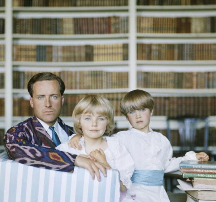 Guinness Family 
1963
by Slim Aarons

Slim Aarons Limited Estate Edition

Hon Desmond Guinness in his recently acquired home Leixlip Castle, Co Kildare, Ireland with his children Marina and Patrick. Their mother is Princess Marie Gabrielle von